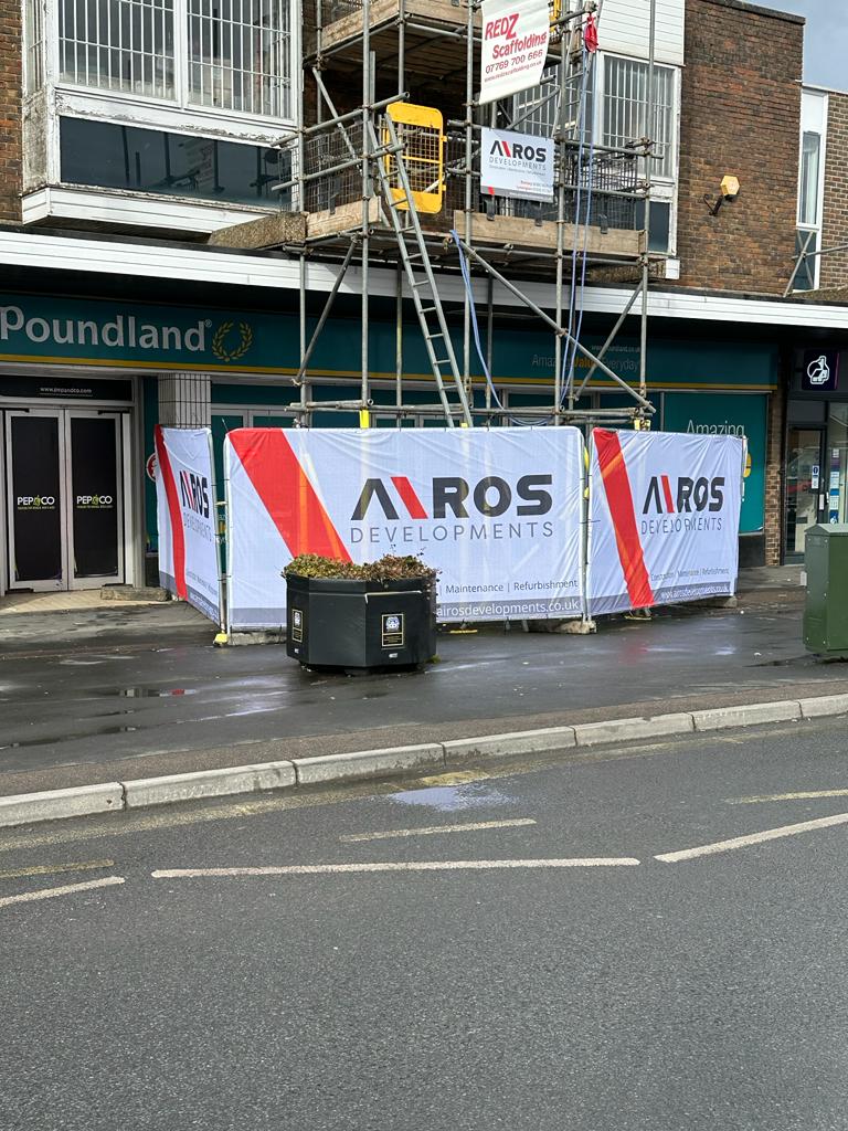 Our banner covering the scaffolding, Airos Developments.