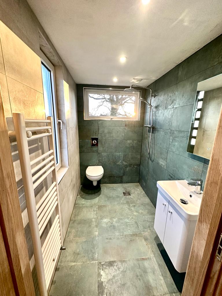 Welcome to our home page. This is one of our wet room projects, open plan bathroom with a drain to wick away water, these are great low maintenance bathroom alternatives and cater to modern design and wheelchair friendly properties.